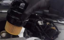 Installing the oil filter on a BMW 325I