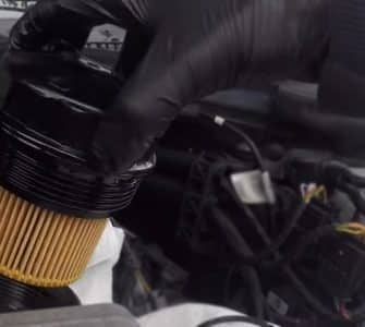 Installing the oil filter on a BMW 325I