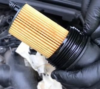 Preparing for a scheduled oil filter change in a BMW E90