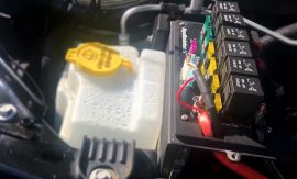 Installed relay block under the hood of the car