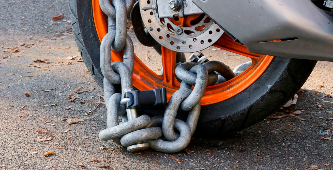 Security chain on the motorcycle wheel